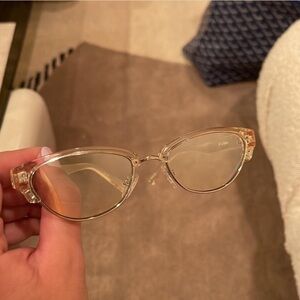 Le Specs translucent champagne sunglasses.